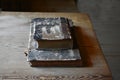 Very old books with leather cover on a table Royalty Free Stock Photo