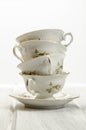 two antique teacups on white background