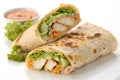 Delicious Chicken Tortilla Wraps with Fresh Lettuce and Dipping Sauce Royalty Free Stock Photo
