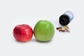 Two apples and pills Royalty Free Stock Photo