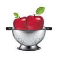 Two apples in steel drainer isolated Royalty Free Stock Photo