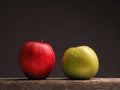 Two apples on a wooden table Royalty Free Stock Photo