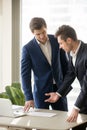 Two appraisers working on architectural project with laptop, bui Royalty Free Stock Photo