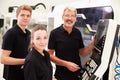 Two Apprentices Working With Engineer On CNC Machinery Royalty Free Stock Photo