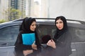 Two Arab Business Women Discuss Something