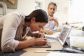 Two Architects Making Models In Office Using Digital Tablet Royalty Free Stock Photo