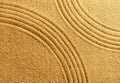Two arcs on yellow sand background summer beach warmth