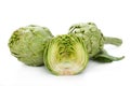 Two artichokes and a half Royalty Free Stock Photo