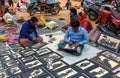 Two Artisan Making Handcrafts with Chisel. Royalty Free Stock Photo