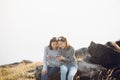 Asia woman Friends using smart phone at a national park Royalty Free Stock Photo