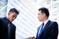 Two asian businessman has talking for business vision. Royalty Free Stock Photo