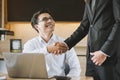 Two asian businessmen shaking hands in the meeting, Business partnership concept Royalty Free Stock Photo