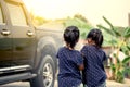 Two asian girls helping parent washing a car Royalty Free Stock Photo