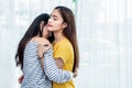 Two Asian Lesbian women looking together in bedroom. Couple people and Beauty concept. Happy lifestyles and home sweet home theme