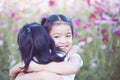 Two asian little girls hugging each other with love Royalty Free Stock Photo