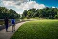 Two Asian men are walking in a park, Cincinnati, Ohio