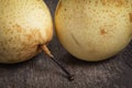 Two asian pears on old wooden table Royalty Free Stock Photo