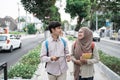 Two asian student walking together go to campus Royalty Free Stock Photo