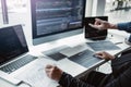 Two asian team working development of programming and encryption technology website design programmers on desk in office Royalty Free Stock Photo