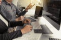 Two asian team working development of programming and encryption technology website design programmers on desk in office Royalty Free Stock Photo