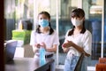 Two asian teenager washing hand with alcohol gel