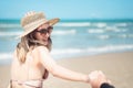 Two Asian women jogging on the beach in the morning. Rest time and holidays Royalty Free Stock Photo