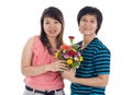 Two asian women with flowers Royalty Free Stock Photo