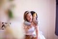 Two asian woman hugging in bedroom together,Happy and smiling,Lesbian,LGBT Royalty Free Stock Photo