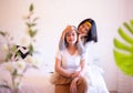 Two asian woman relaxing in the bedroom together,Happy and smiling,Lesbian,LGBT Royalty Free Stock Photo