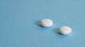 Two aspirin pills Royalty Free Stock Photo