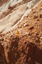 Two astronauts exploring a mars cliff, concept