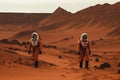 two astronauts exploring the red dunes of colonized mars Royalty Free Stock Photo