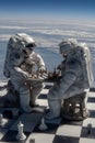 Two astronauts in space, engaged in a chess game on a floating board, surrounded by clouds and the vastness of the universe, Royalty Free Stock Photo