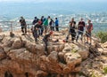 Two athletes begin the descent on a rope down - climbing - snapping - the rope from the mountain to Keshet, Cave in northern