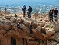 Two athletes begin the descent on a rope down - climbing - snapping - the rope from the mountain to Keshet, Cave in northern