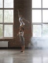 Two athletic modern ballet dancers posing against studio background Royalty Free Stock Photo