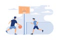 Two athletic young men playing basketball in urban stadium. Guys training on outdoor court with Royalty Free Stock Photo