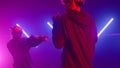 Two hiphop dancers battling in nightclub stage closeup. Couple dancing freestyle