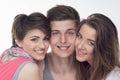 Two attractive teen girls and a boy have fun, Royalty Free Stock Photo