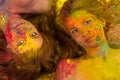 Two attractive women in the colors of Holi Royalty Free Stock Photo