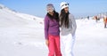 Two attractive women friends at a ski resort Royalty Free Stock Photo