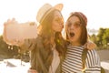 Two attractive young girls friends having fun together Royalty Free Stock Photo