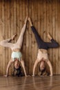 Sportswomen doing handstand Royalty Free Stock Photo