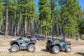 Two ATVs in a Forest