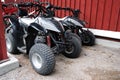 Two ATVs outdoor near the house Royalty Free Stock Photo