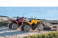 Two ATVs on the sea shore Royalty Free Stock Photo