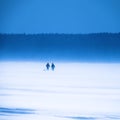 Two fishermen. Ice fishing Royalty Free Stock Photo