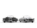 Two awesome black and white vintage cars - side by side