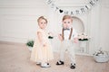 Two babies wedding - boy and girl dressed as bride and groom Royalty Free Stock Photo