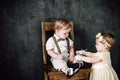 Two babies wedding - boy and girl dressed as bride and groom Royalty Free Stock Photo